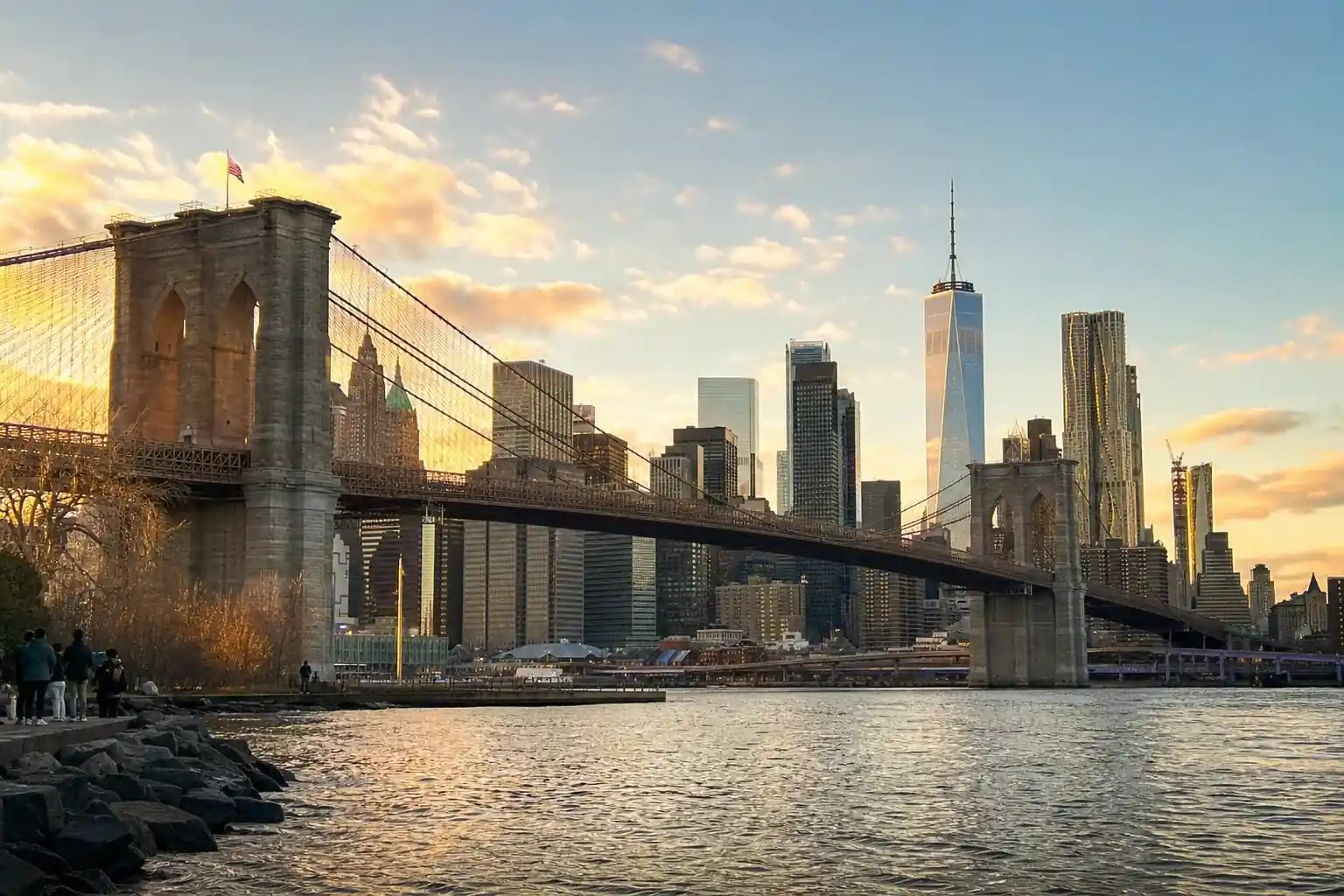 Things to do in Lower Manhattan: the skyline and Brooklyn Bridge at golden hour