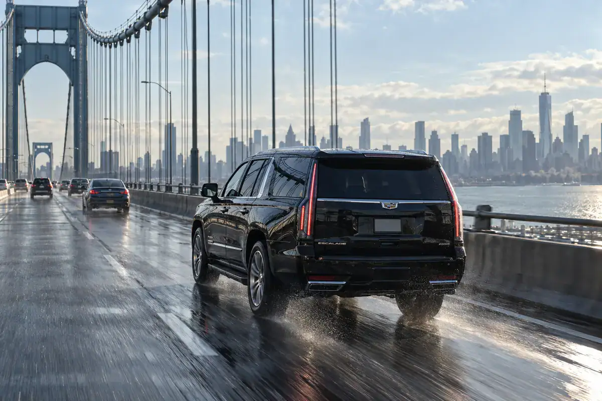 Black SUV crossing the Whitestone Bridge on a Connecticut to JFK airport car service transfer