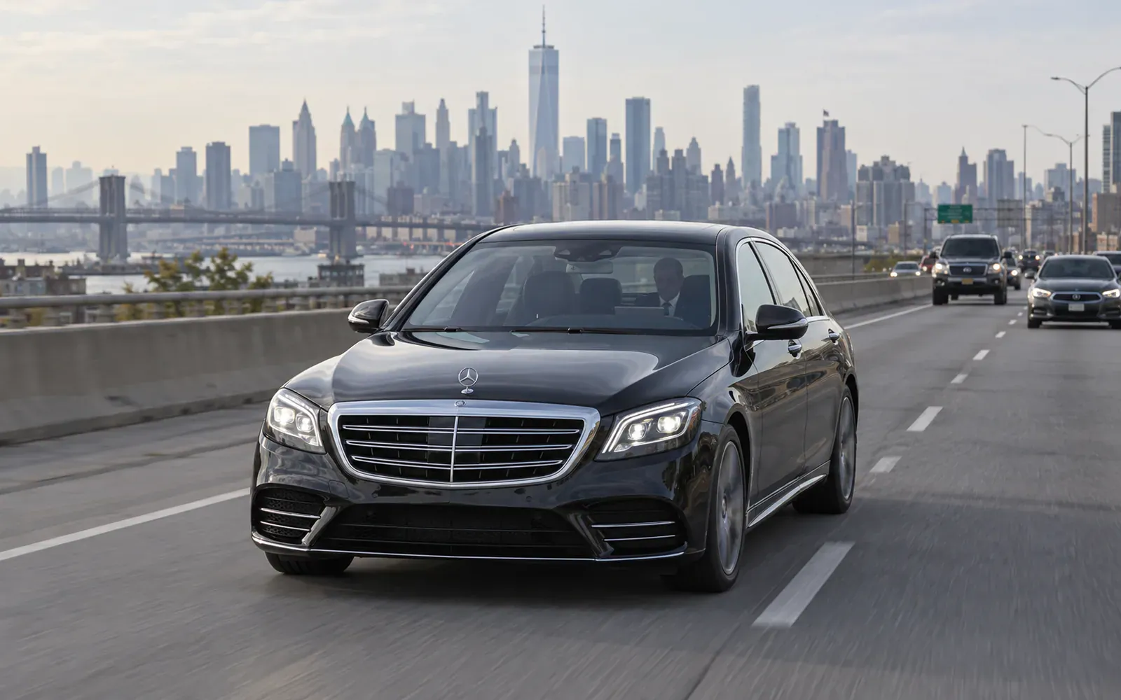 Black Mercedes S-Class on the highway leaving New York City